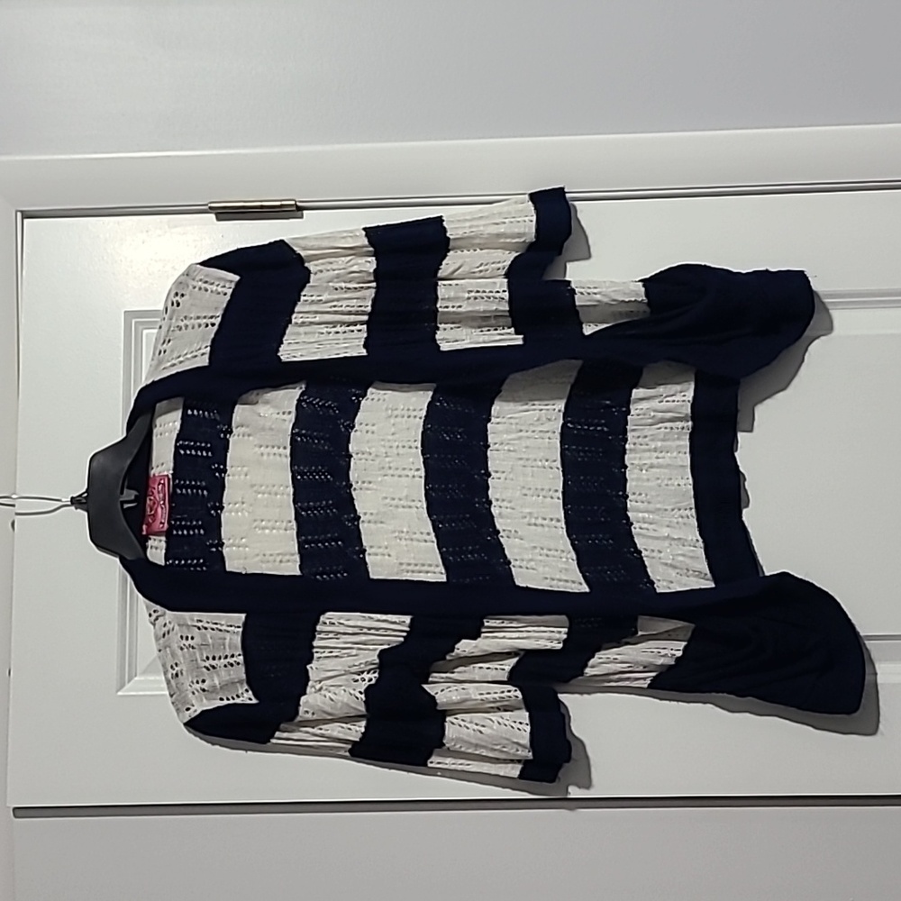 Woman's blue and white striped knitted sweater with pockets